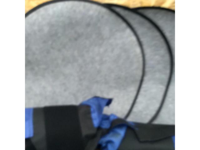 Set of 4 large tire covers (manufacturer unknown)