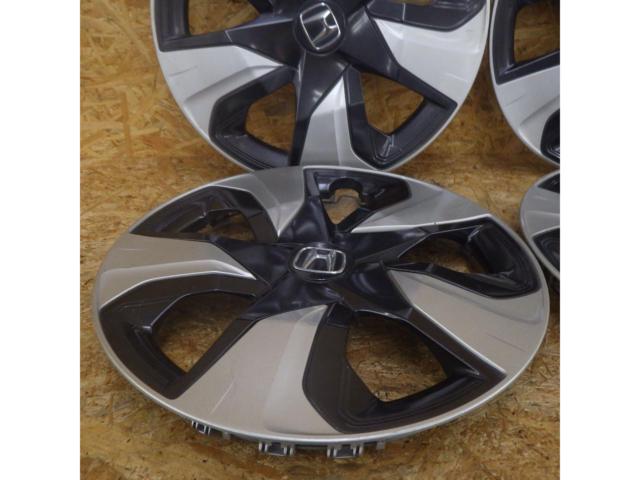 Genuine Honda wheel caps for 215-inch wheels.