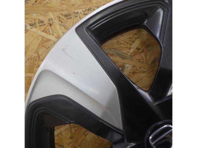 Genuine Honda wheel caps for 215-inch wheels.