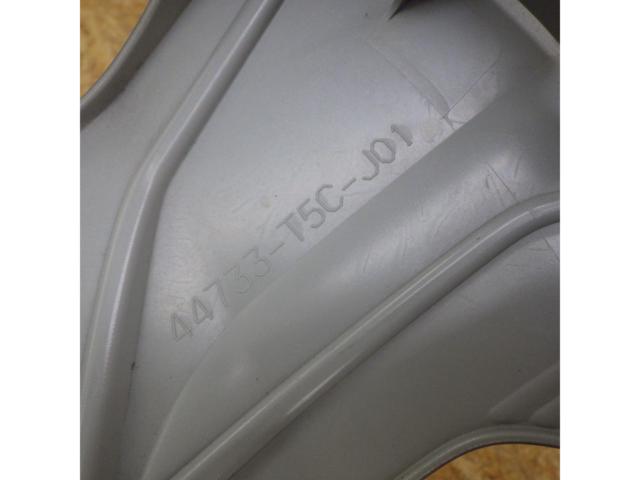 Genuine Honda wheel caps for 215-inch wheels.