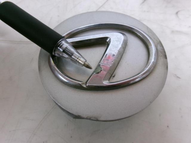 A great find: a genuine Lexus part.
Center cap
Four