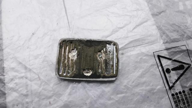 Nissan genuine
Rear trunk emblem
V8