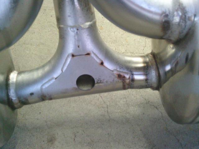 GANADOR
Center double-exit blue tail muffler