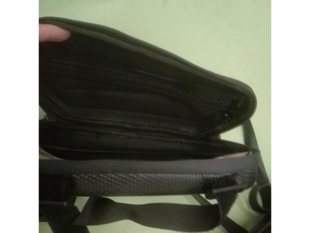 Unknown Manufacturer
Nylon side bag
Left and right (approximately 26 cm in length)