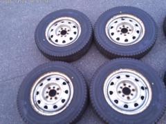 【TOPY(トピー)】 14インチマルチスチールホイール+【BRIDGESTONE】BLIZZAK VL 10 A ファミリア装着