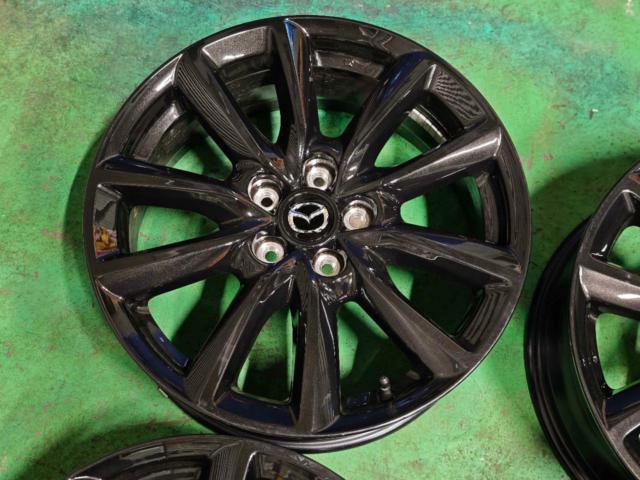 Mazda Genuine Mazda3
Black Tone Genuine Aluminum Wheels