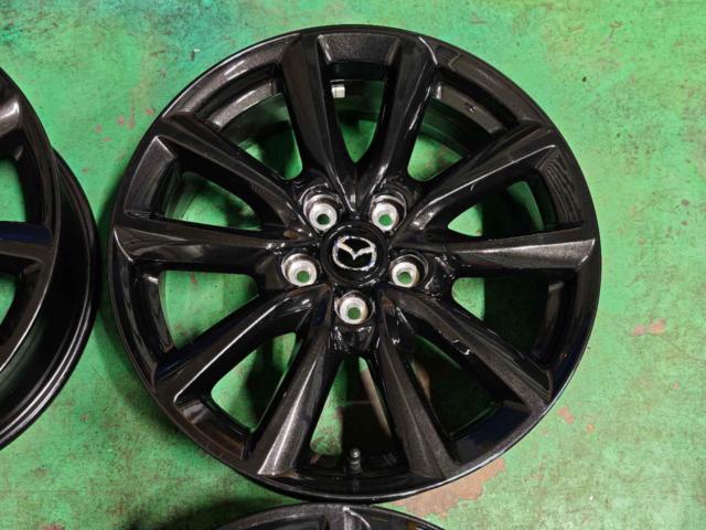 Mazda Genuine Mazda3
Black Tone Genuine Aluminum Wheels